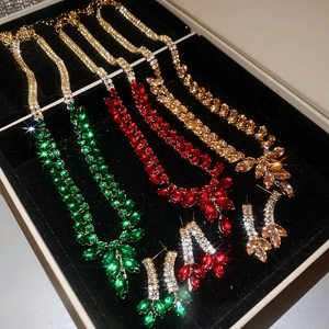 Detailed view of zircon wheat tassel jewelry sets in elegant velvet gift boxes
