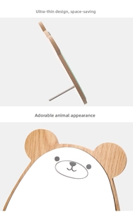Detail view of the ultra-thin body and cute cartoon bear wooden makeup mirror