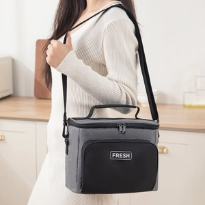 Gray insulated lunch bag with FRESH logo, adjustable strap and oxford cloth texture