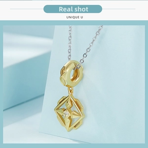 Detailed close-up of S925 sterling silver gold-plated square pendant with zircon stone