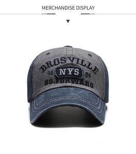 Detail of NYS heavy embroidery and 3D lettering on washed blue and grey baseball cap