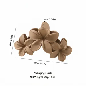Matte khaki floral hair claw clip featuring three layered flowers with detailed dimensions