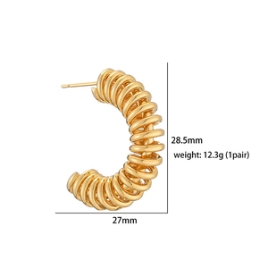 Detailed view of C-shaped gold earrings showing dimensions 28.5mm by 27mm and weight