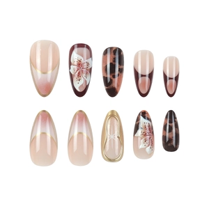 3D gold flower leopard press-on nails set with long almond French manicure design