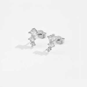 Elegant S925 sterling silver stud earrings featuring three graduated round cubic zirconia stones