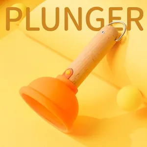 Creative plunger-shaped bedside night light with wooden handle and orange silicone base
