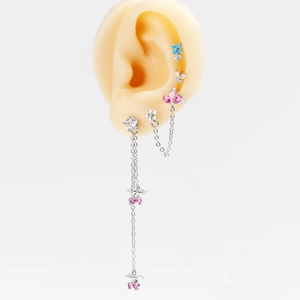 Elegant silver tassel earrings set with colorful zircon stones on model display