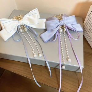 Elegant silk bow hair claw clips with faux pearl tassels in cream and purple colors