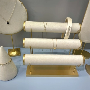 Velvet jewelry display set with gold metal stands for necklaces and bracelets