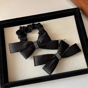 Elegant black satin bow hair clip and scrunchie set with sparkling rhinestone buckle