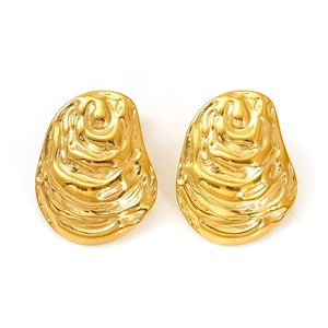 Vintage irregular golden titanium steel earrings with textured fold design on white background