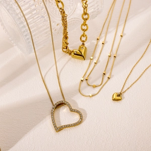 Elegant gold heart pendant necklaces collection featuring rhinestone heart and bead chain