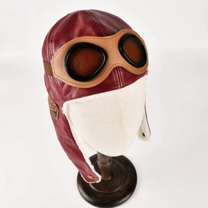 Kids warm pilot trapper hat in burgundy PU leather with goggles and white faux fur lining