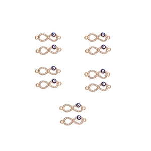 Macro view of gold infinity connectors with blue evil eye pendants and zircon accents