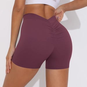 Detailed view of high waist scrunch butt yoga shorts in wine red for fitness