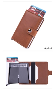 Detail view of apricot crazy horse leather card holder with automatic aluminum slide pop-up case