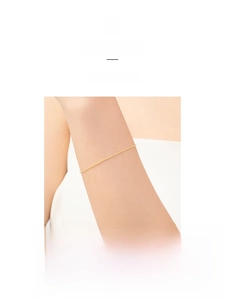 Detailed view of a minimalist S925 sterling silver beaded bracelet on a wrist