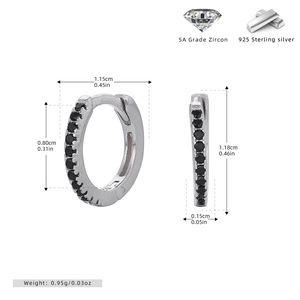 Macro detail of 925 sterling silver hoop earrings with black zircon stones and measurements