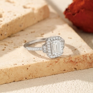 Classic 1ct emerald cut moissanite ring in 925 silver with halo setting on stone