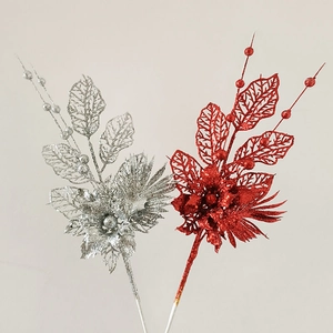 Detail of red and silver artificial lily stems with shimmering glitter for Christmas decor