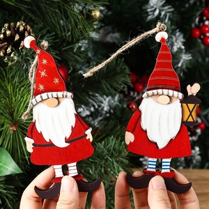 Set of two handcrafted wooden Santa gnome ornaments for festive Christmas tree decoration
