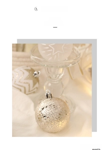 Detail of champagne gold and white Christmas balls with glitter patterns for tree decor