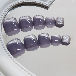 Deep purple-grey cat eye press-on toe nails with silver glitter gradient and mirror reflection