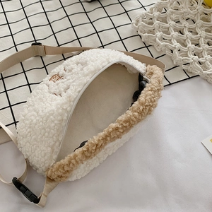 Plush lamb fleece crossbody chest bag with adjustable strap in beige and tan color
