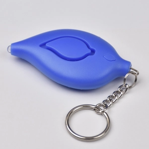 Close-up of blue leaf-shaped personal alarm with LED light and metal keychain loop