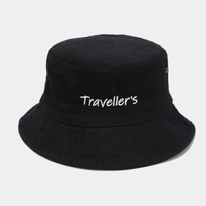 Detail of embroidered Traveller's text on black washed cotton foldable bucket hat