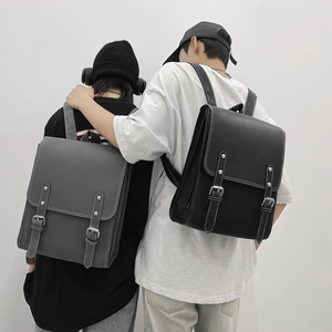 Minimalist vintage PU leather backpack in black and gray for women showing on models