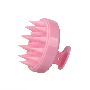 Pink silicone scalp massager brush with ergonomic handle for hair cleaning and relaxation