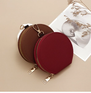 Litchi pattern round mini zipper coin pouches in dark brown and wine red with gold hooks
