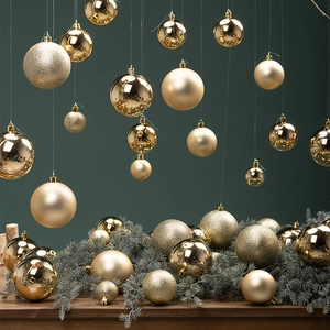 Boules de Noël dorées champagne en finitions brillante, mate et pailletée pour décoration