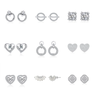 Macro view of nine assorted 925 sterling silver stud earrings with sparkling cubic zirconia