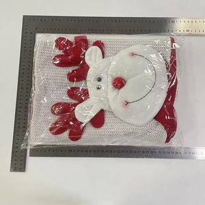 Detailed size measurement of Christmas elk character chair cover with a metal ruler scale