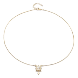 Gold heart pendant necklace with square frame and cross charm on white background