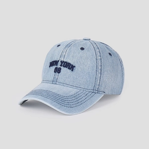 Close-up of NEW YORK 08 embroidery on light blue washed denim baseball cap