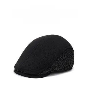 Detail view of winter baseball cap featuring warm ear flaps and knitted texture