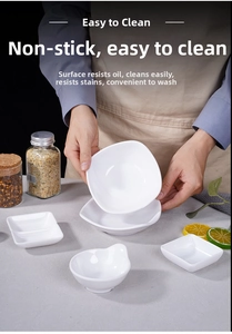 Close-up of white melamine dipping sauce dishes in various minimalist shapes and sizes