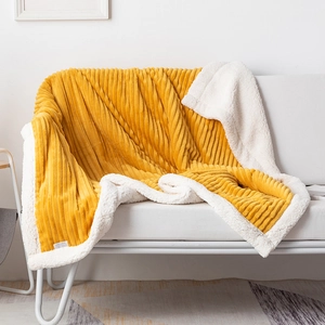 Thick double-layered yellow striped flannel blanket with soft white sherpa fleece lining