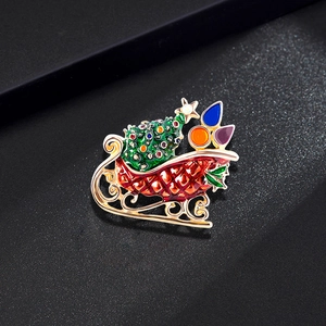 Christmas sleigh brooch with enamel tree and rhinestones on high-quality metal finish