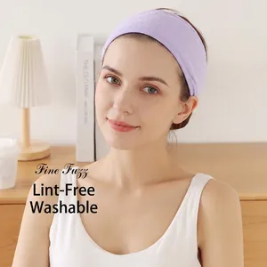 Detail of soft purple elastic headband with fine fuzz texture shown on a female model