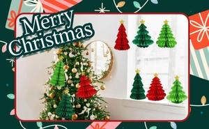 Macro view of paper honeycomb Christmas trees with gold star toppers in a festive setting