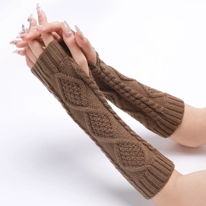 Detailed close-up of brown cable knit arm warmers with classic diamond textured pattern