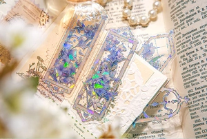 Macro detail of purple flower PVC bookmark with holographic gold foil on vintage paper