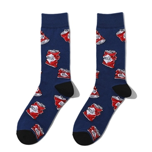 Detailed view of navy cotton crew socks featuring red and white beer can pattern designs