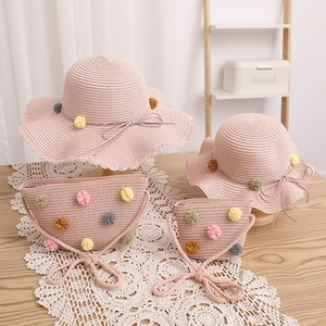 Pink straw sun hat and bag set with colorful pom-poms for women and children
