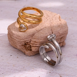 Macro shot of 18K gold plated double-layer wrap ring with heart-shaped white crystal