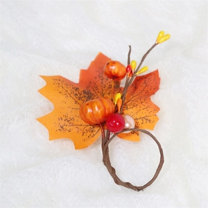 Autumn maple leaf napkin ring with pumpkins and berries for Thanksgiving table decor